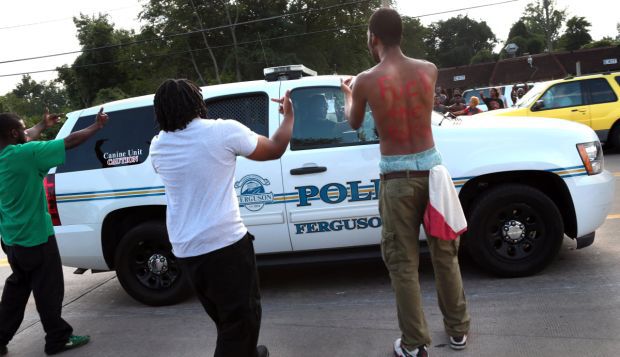 Protests, arrests continue in Ferguson